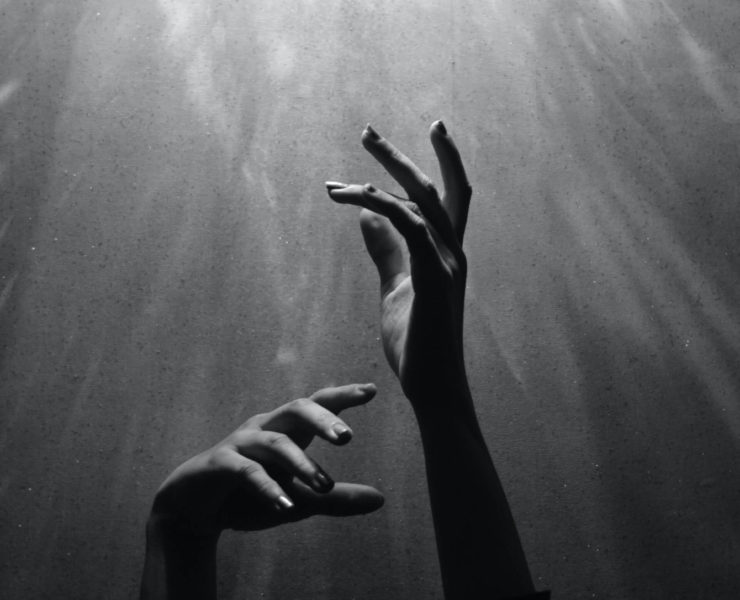 Hands reaching out to God