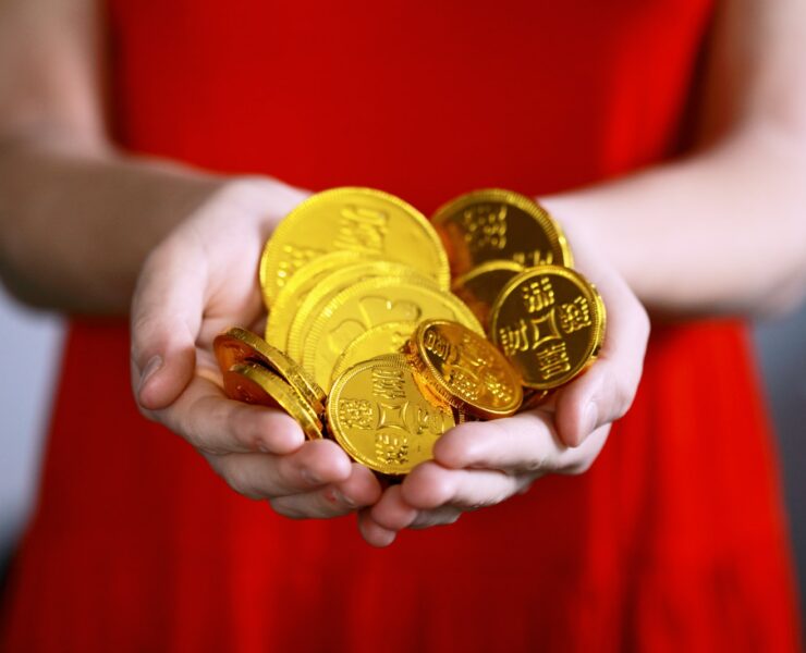 person holding wealth